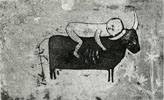 Enfant sur un taureau